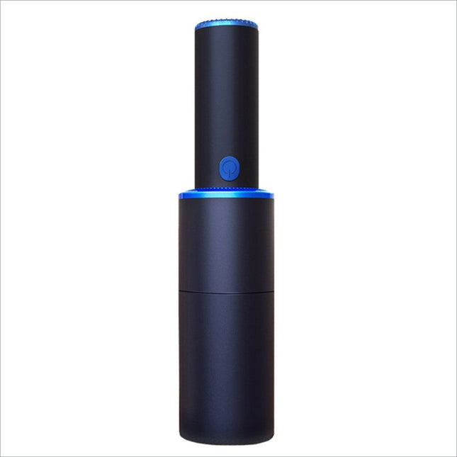 Black cylindrical mini vacuum cleaner with blue led accents and power button featuring strong suction for home office car cleaning
