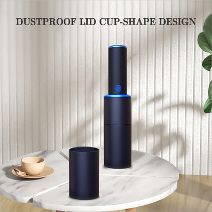 Black cylindrical mini vacuum cleaner with blue accent lighting dustproof lid strong suction for home office car use