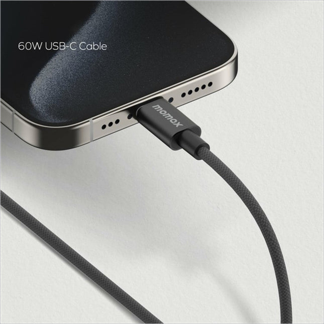 Black braided 60w fast charging usb c cable with nylon charging wire and momox logo on matte connector