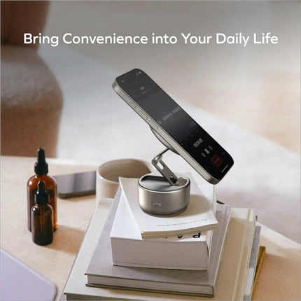 Silver metallic momax kh20 electric magnetic phone stand with 360° rotation and phone stand auto suction holding iphone
