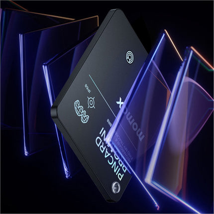 Black rectangular momax pincard pro mini key finder with matte finish and blue led accents supporting wireless charging