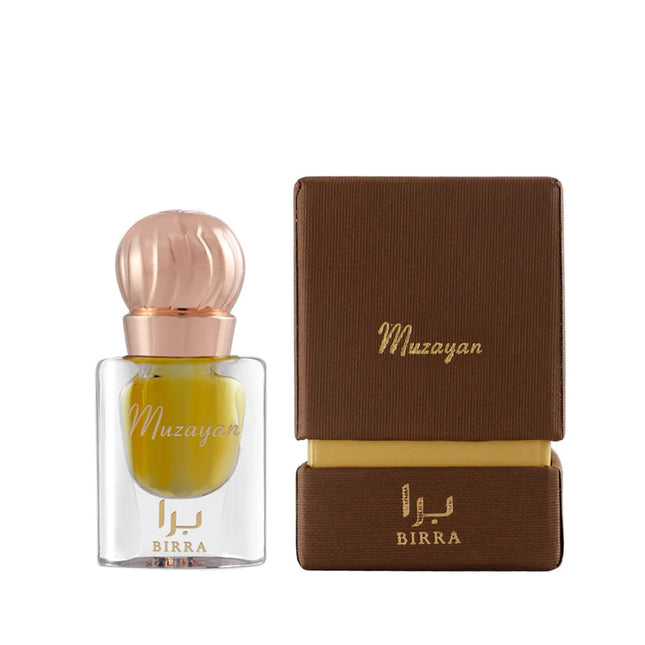 Muzayan attar glass bottle featuring a stylish golden cap placed beside a neatly designed brown box by Birra, emphasizing fine fragrance presentation.
