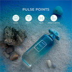 A translucent blue glass bottle of next aqua eau de toilette perfume with matching cap and white label for korean skin care