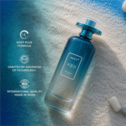 A sleek gradient blue glass perfume bottle with a metallic teal cap labeled next aqua for korean skin care use
