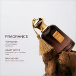 A dark amber glass perfume bottle with gold cap and tassel labeled arabian scent by maison margiela for skin care