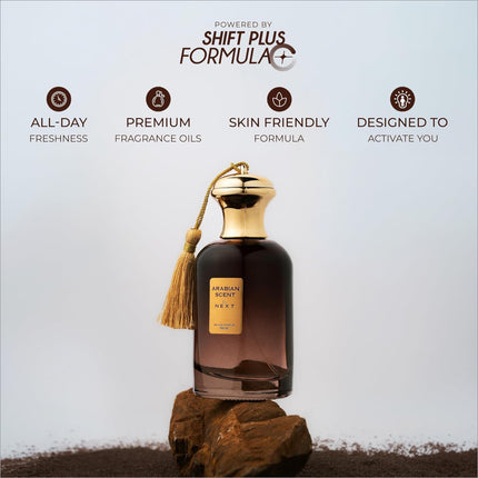 Dark amber glass perfume bottle with gold cap and tassel labeled arabian scent by next for skin care use