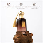 Next arabian scent perfume in a dark amber glass bottle with gold cap and tassel on a rustic wooden base for skin care
