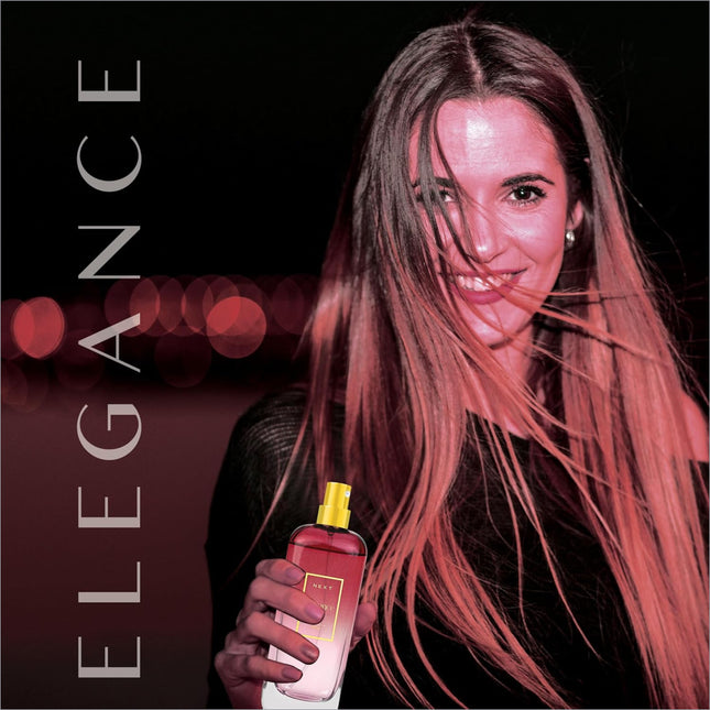 A sleek transparent glass bottle of next elegance eau de perfume with a golden spray nozzle for korean skin care use
