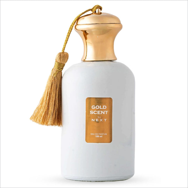 A sleek white perfume bottle with a gold-toned cap and tassel labeled gold scent by Next for skin care and fragrance