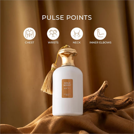 White perfume bottle with gold-toned cap and tassel labeled gold scent by next for skin care fragrance use
