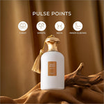 White perfume bottle with gold-toned cap and tassel labeled gold scent by next for skin care fragrance use