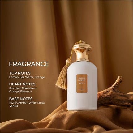 A white perfume bottle with a gold cap and tassel labeled gold scent next for skin care fragrance use