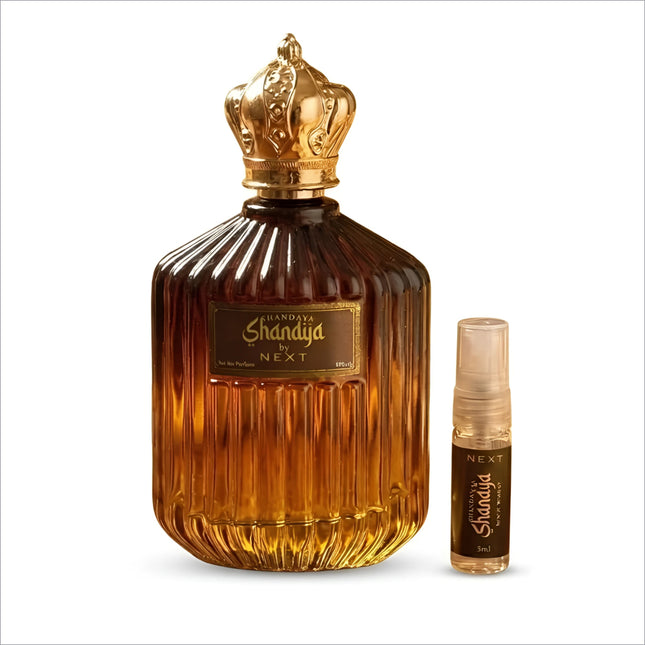 Golden crown topped amber glass perfume bottle with ribbed design and shandaya by next label for korean skin care