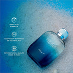 A sleek gradient blue glass bottle of next true blue eau de parfum 100ml with a silver and teal ribbed cap for skin care