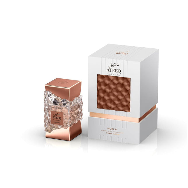 Elegant packaging of NUSUK Ateeq Perfume for Men 100ml, featuring citrus spice fragrance notes and deep woody undertones, perfect for gifting on special occasions.