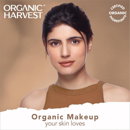 Flat lay of Organic Harvest Soft Matte Compact next to makeup brushes, demonstrating its role as a must-have organic face compact.