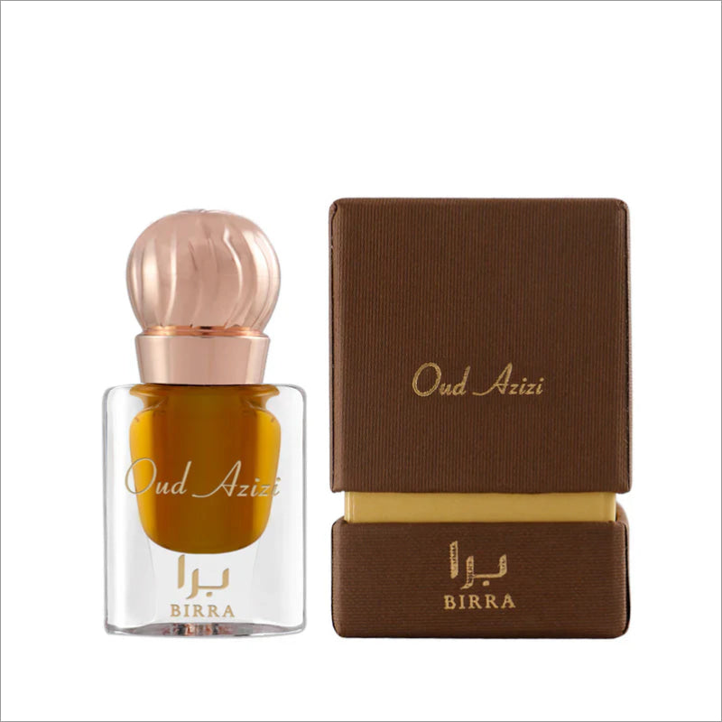 Oud Azizi attar packaging with a luxurious glass bottle featuring a rose gold cap, accompanied by a stylish brown box that highlights the brand BIRRA.