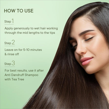 Close-up of QUENCH Anti Dandruff Conditioner showing its key ingredients like tea tree extracts that aid in dandruff management.
