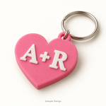 Rubnic sample pink 3D printed heart keychain with custom couple initials