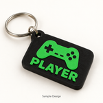 Rubnic sample black and green 3D printed gaming keychain with controller motif