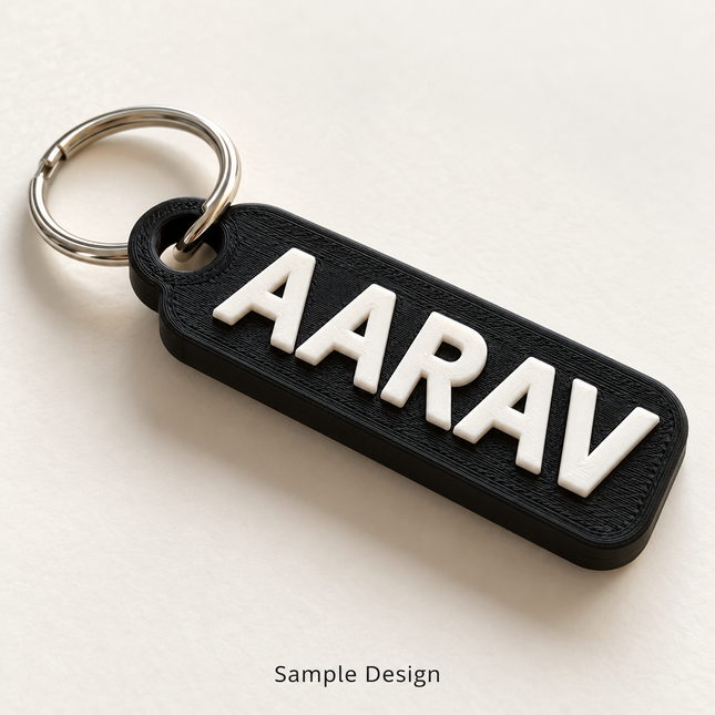 Rubnic sample black single-line 3D printed name keychain with white AARAV text