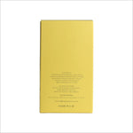 The back view of Sheen premium perfume packaging, detailing the ingredient list and warnings, presented on a yellow box.