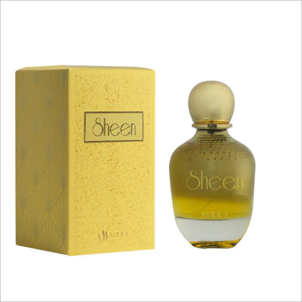 Sheen premium perfume displayed with its packaging, highlighting the yellow box and the glass bottle featuring a round gold cap and elegant design.