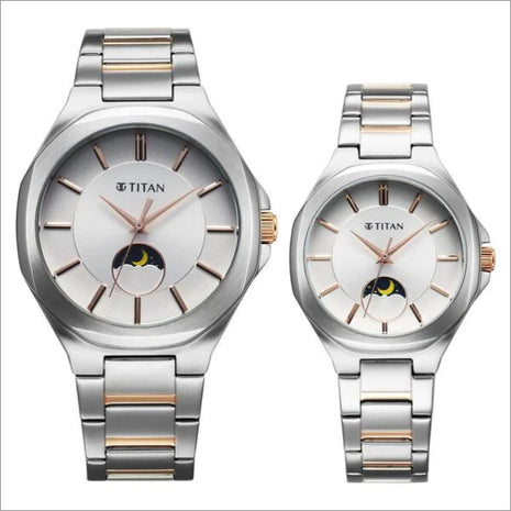 a couple of watches sitting next to each other