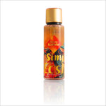 Simply Ecstatic Body Mist bottle with a colorful floral design, featuring a golden cap and label. The bottle is elegantly presented, showcasing a tropical theme perfect for vibrant and cheerful scents.