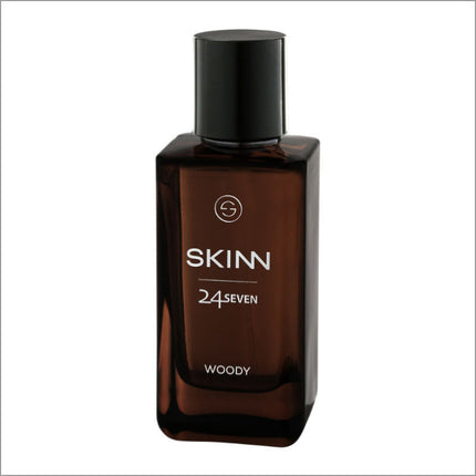 a bottle of skin cologne on a white background