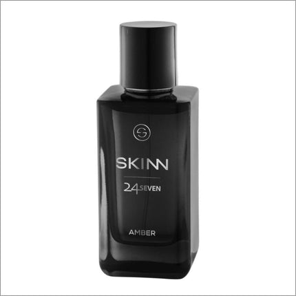 a bottle of skinn cologne on a white background