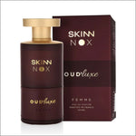 a bottle of skin nox oudixe perfume next to a box