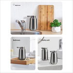 Stainless steel automatic soap dispenser with sleek cylindrical body and brushed metallic finish for kitchen and bathroom