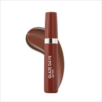 A sleek matte burgundy tube of swiss beauty glaze days lip tint with silver band and white lettering for juicy hydrating lip color