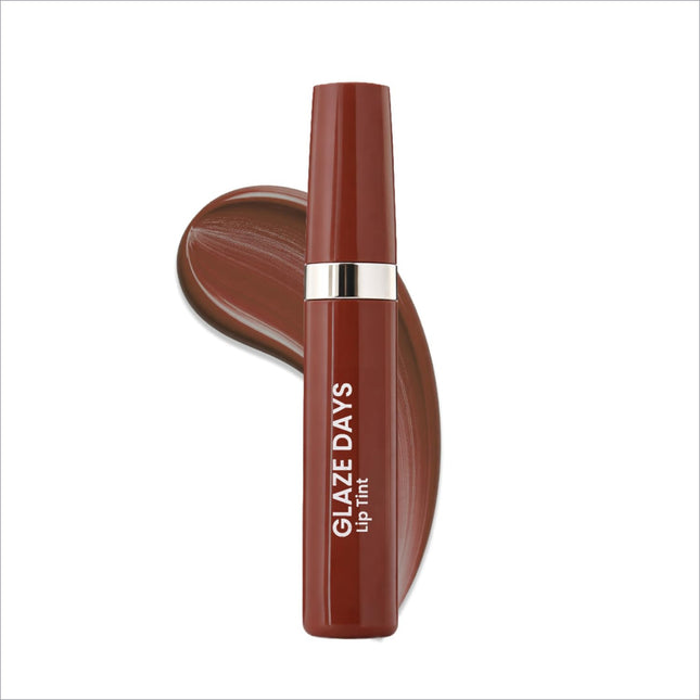 A sleek matte burgundy tube of swiss beauty glaze days lip tint with silver band and white lettering for juicy hydrating lip color