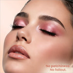 A woman with closed eyes wearing shimmering pink eyeshadow from swiss beauty limitless eyeshadow palette shade stargaze