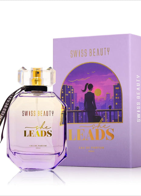 Close-up of the Swiss Beauty She Leads EDP bottle, emphasizing its long lasting perfume fragrance with notes of Elemi and Violet Flower.