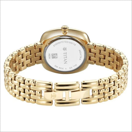 a women's watch with a gold bracelet