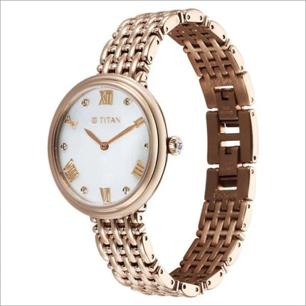 a women's watch with a white dial