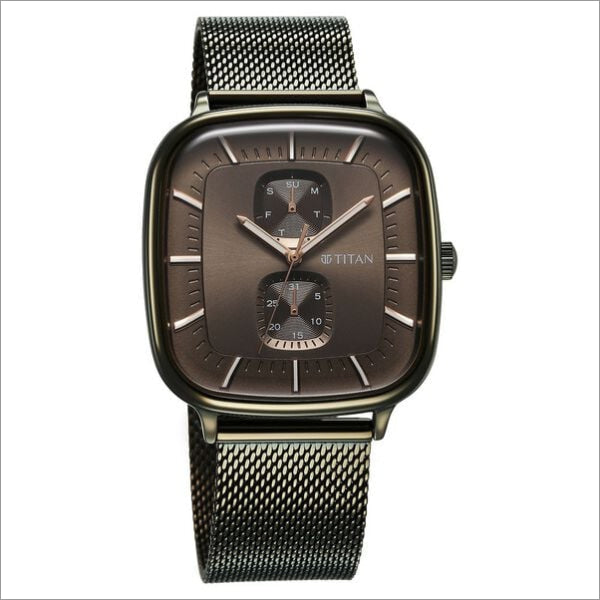 a watch with a black face and a silver mesh strap