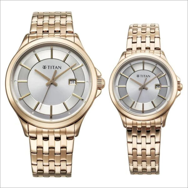 a couple of watches sitting next to each other