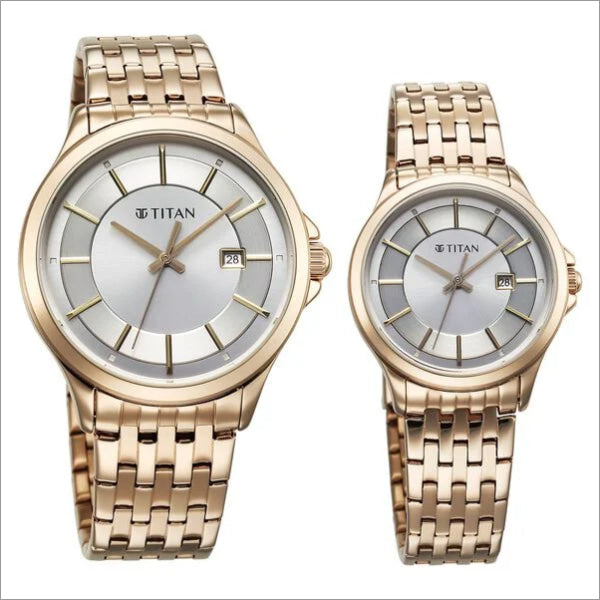 a couple of watches sitting next to each other