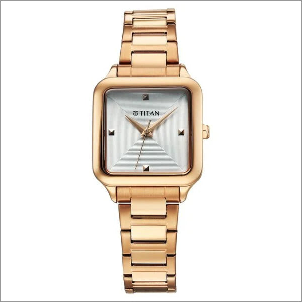 a women's watch with a gold bracelet