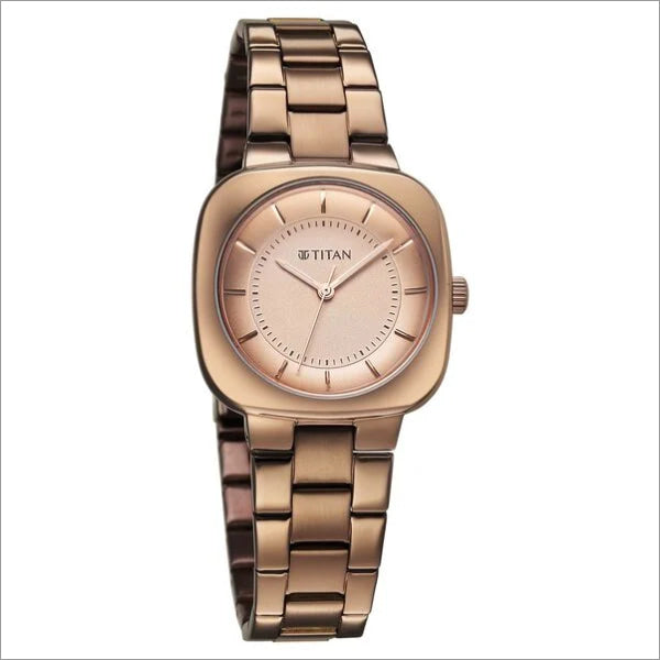 a women's watch with a pink dial