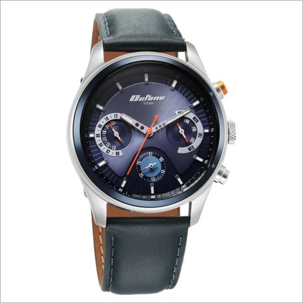 a watch with a blue dial and brown leather strap
