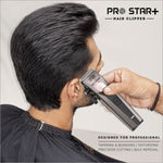a man getting his hair cut with a clipper