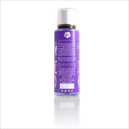 Back view of the Verdict Body Mist by BIRRA showcasing detailed product information and ingredient list. The purple canister retains its tropical theme, offering insights into usage and safety instructions.