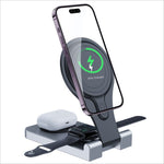 A sleek silver magnetic wireless charger portable folding stand with black accents charging an iPhone at 85 percent