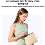 Beige leather crossbody bag with top handle and adjustable strap paired with yesido mg23 wireless hair straightener brush