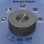 Gray cylindrical yt200 usb rechargeable mini projector with brushed metal dial and ports for korean skin care videos